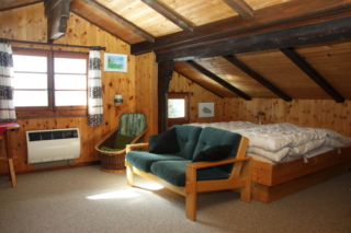 Doppelzimmer mit Holzofen