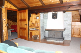 Doppelzimmer mit Holzofen